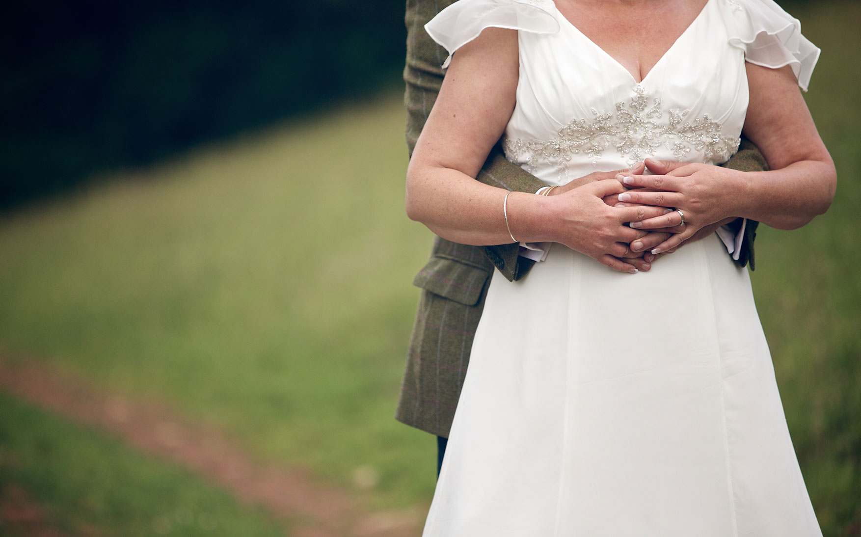 The bride and groom embrace