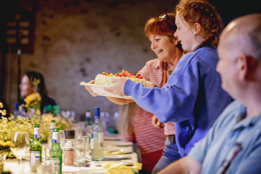 Diners eating at a long table